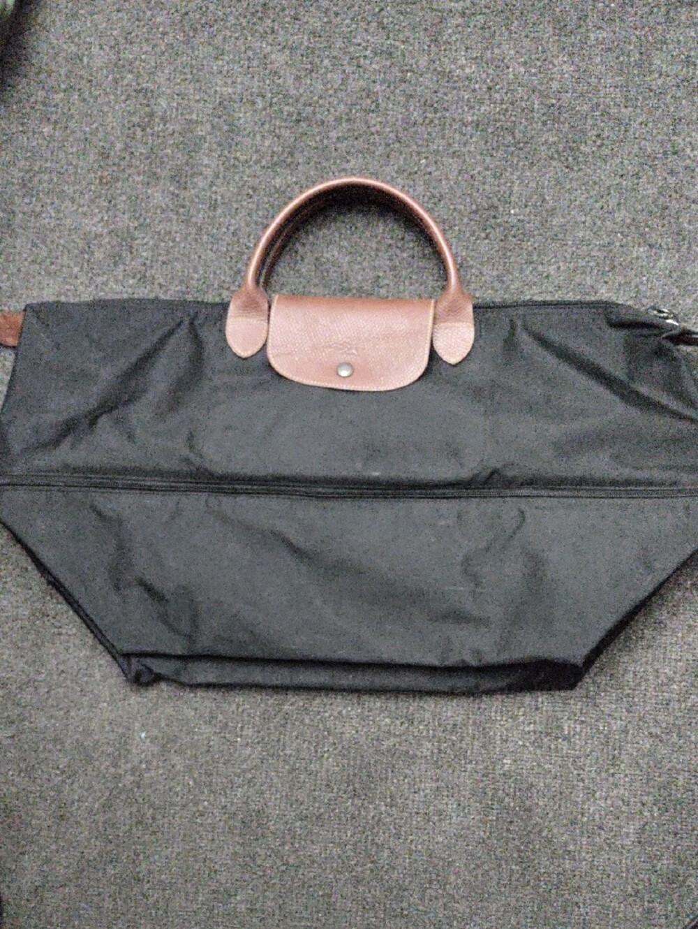 Longchamp Expandable Black Travel Duffle Bag with Brown Leather Handles
